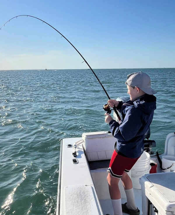 Son fighting nice bluefish.