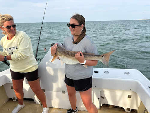 Drumrunner anglers with nice Ocracoke red drum.