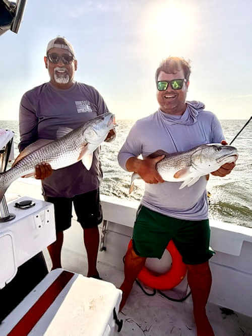 Two Missphitty anglers with a nice red drum.