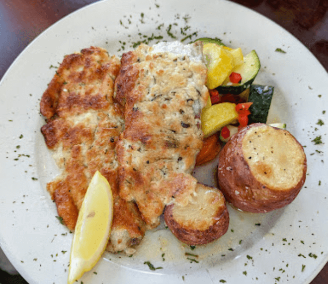 Pan fried red drum with potatoes and summer vegtables